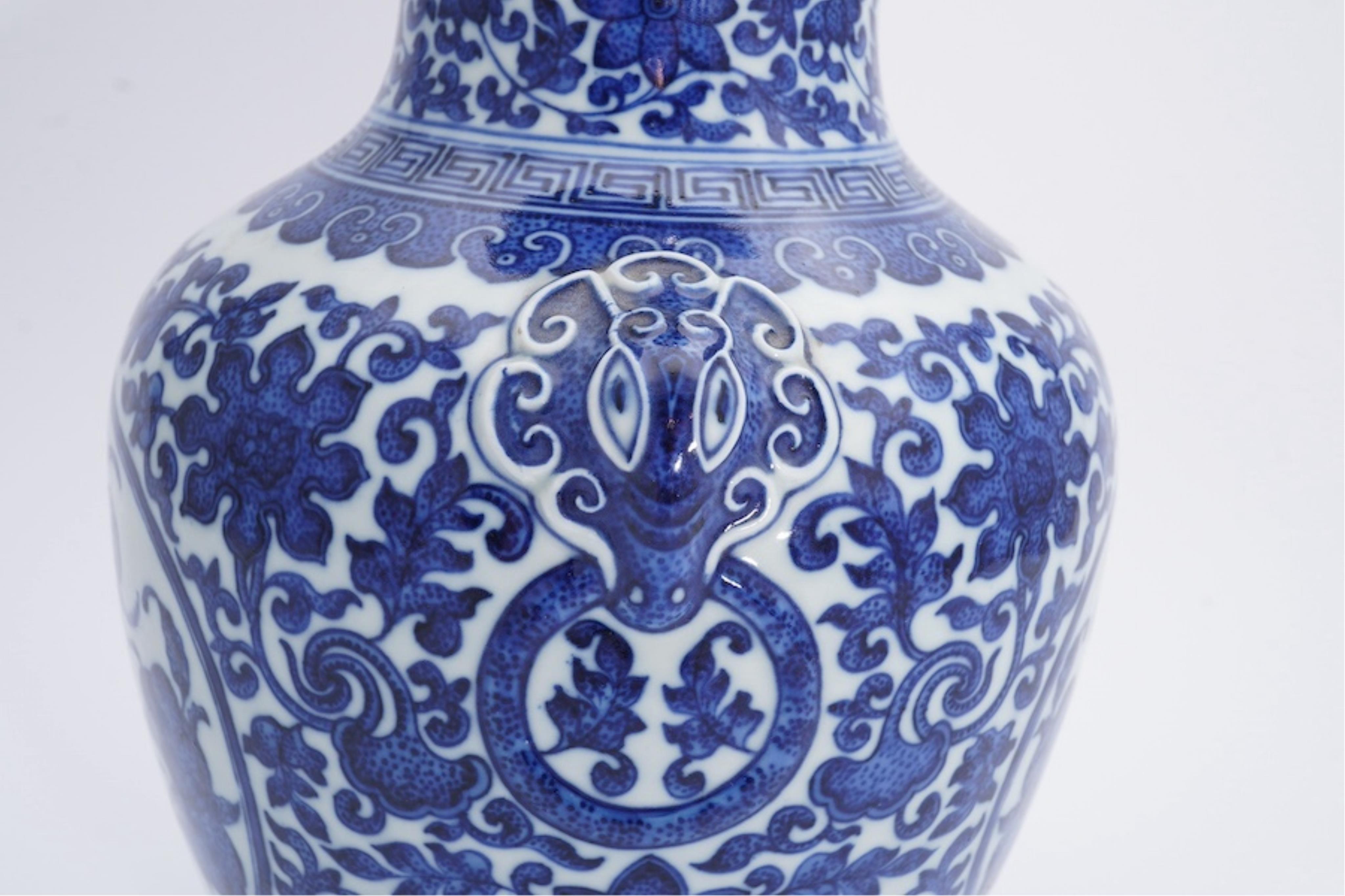 A Chinese blue and white 'peaches' vase, Qianlong mark but later, 27cm high. Condition - good